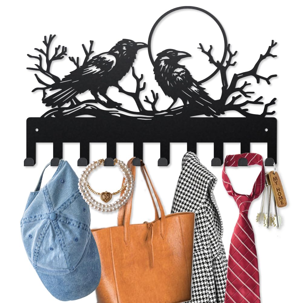 Ganchos de metal para pared con diseño detallado de aves y ramas
