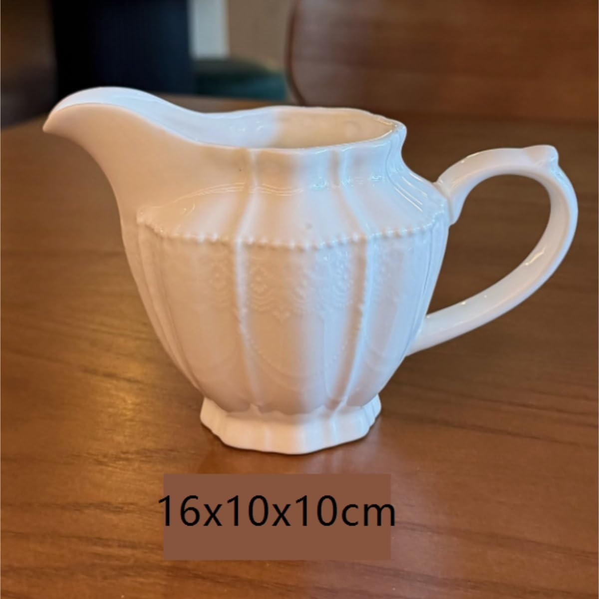 Soßenkrug aus Keramik, Soßen-Milchkännchen, Restaurant, Zuhause, Muster, Relief, weiße Keramik, Nachmittagstee, Kaffee, Milchkännchen, Tasse, Sauciere
