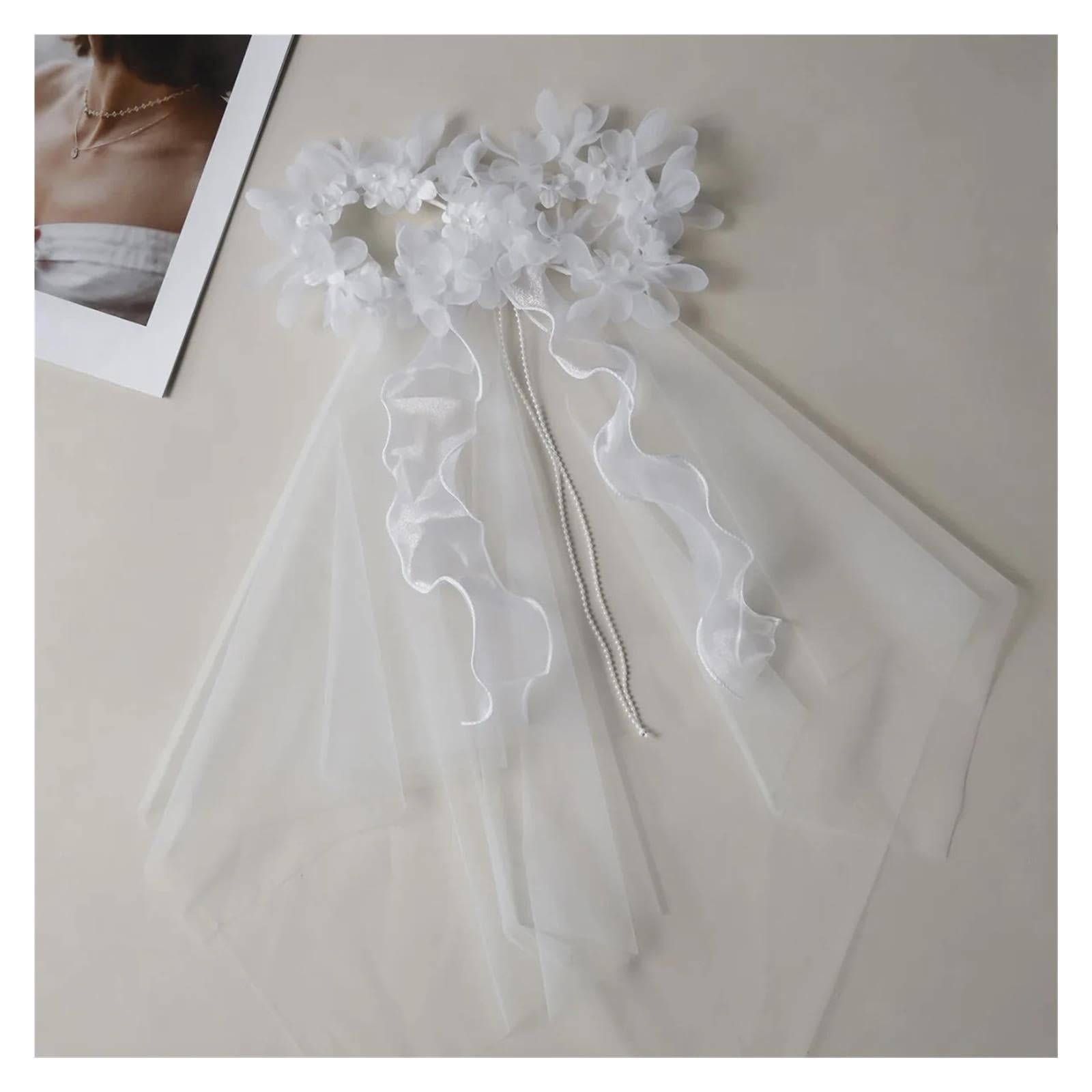Velo da sposa bianco fata il giorno delle nozze con farfalla