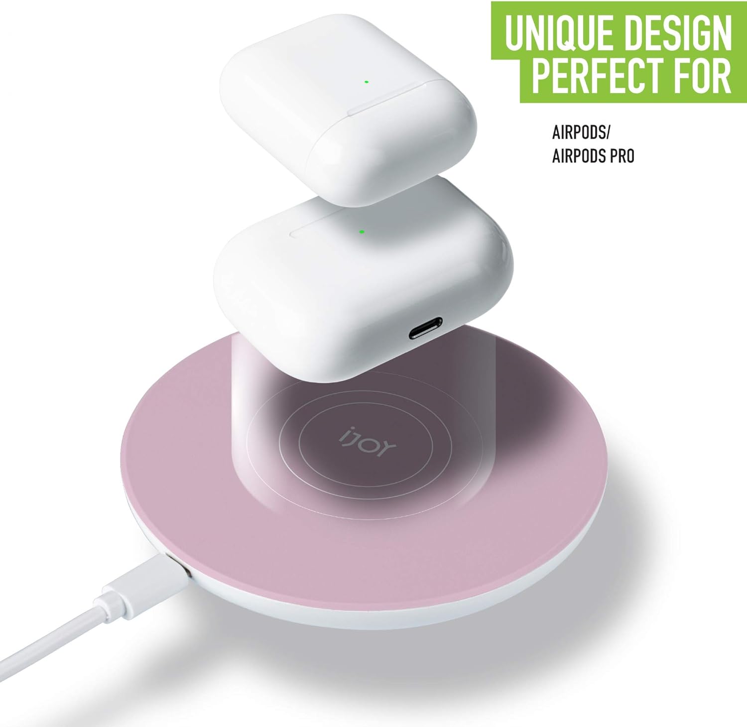 Image showing AirPods cases charging on the iJoy wireless pad.
