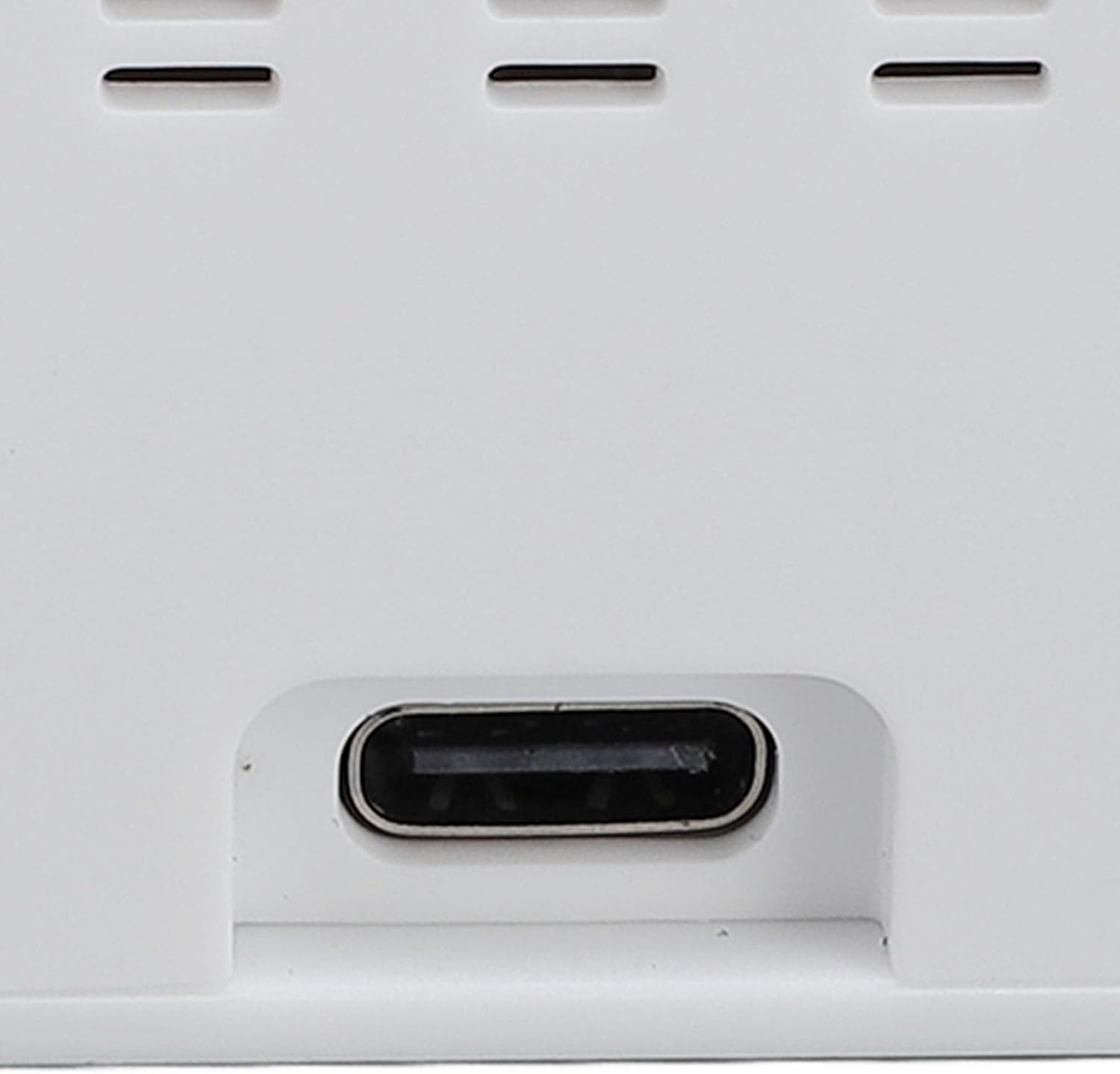 Close-up of the USB-C port on the back of the Cuifati WiFi Digital Weather Clock.