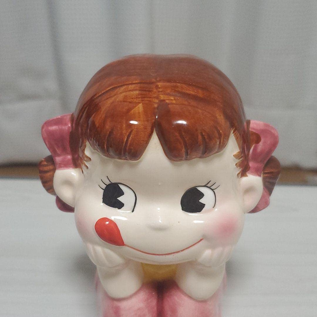 Amazon.co.jp: 不二家 夢見るペコちゃん 貯金箱 : Toys & Games