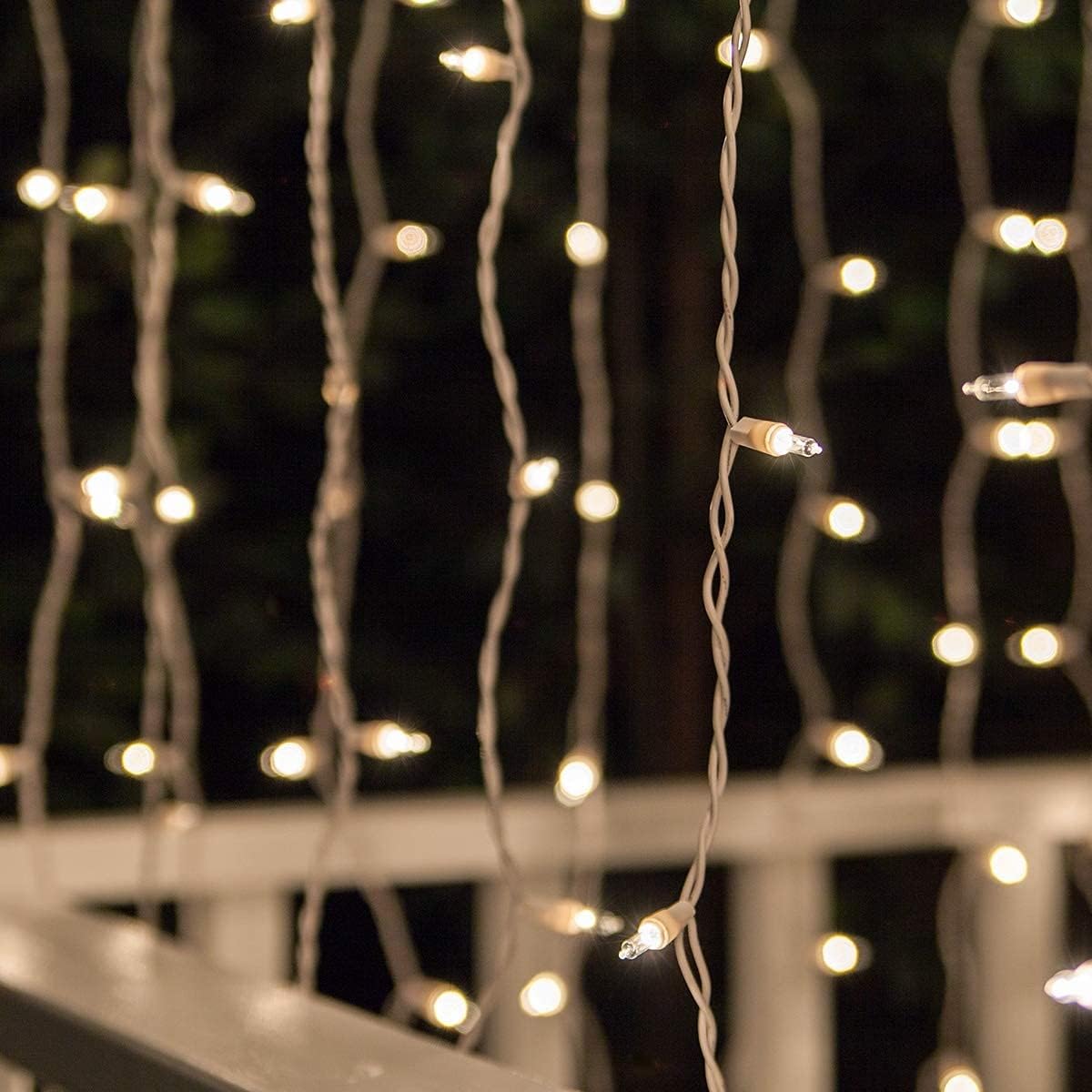 Kringle Traditions 150 Clear Incandescent Curtain Icicle Lights, 5.5' String Lights for Bedroom, Indoor/Outdoor Use
