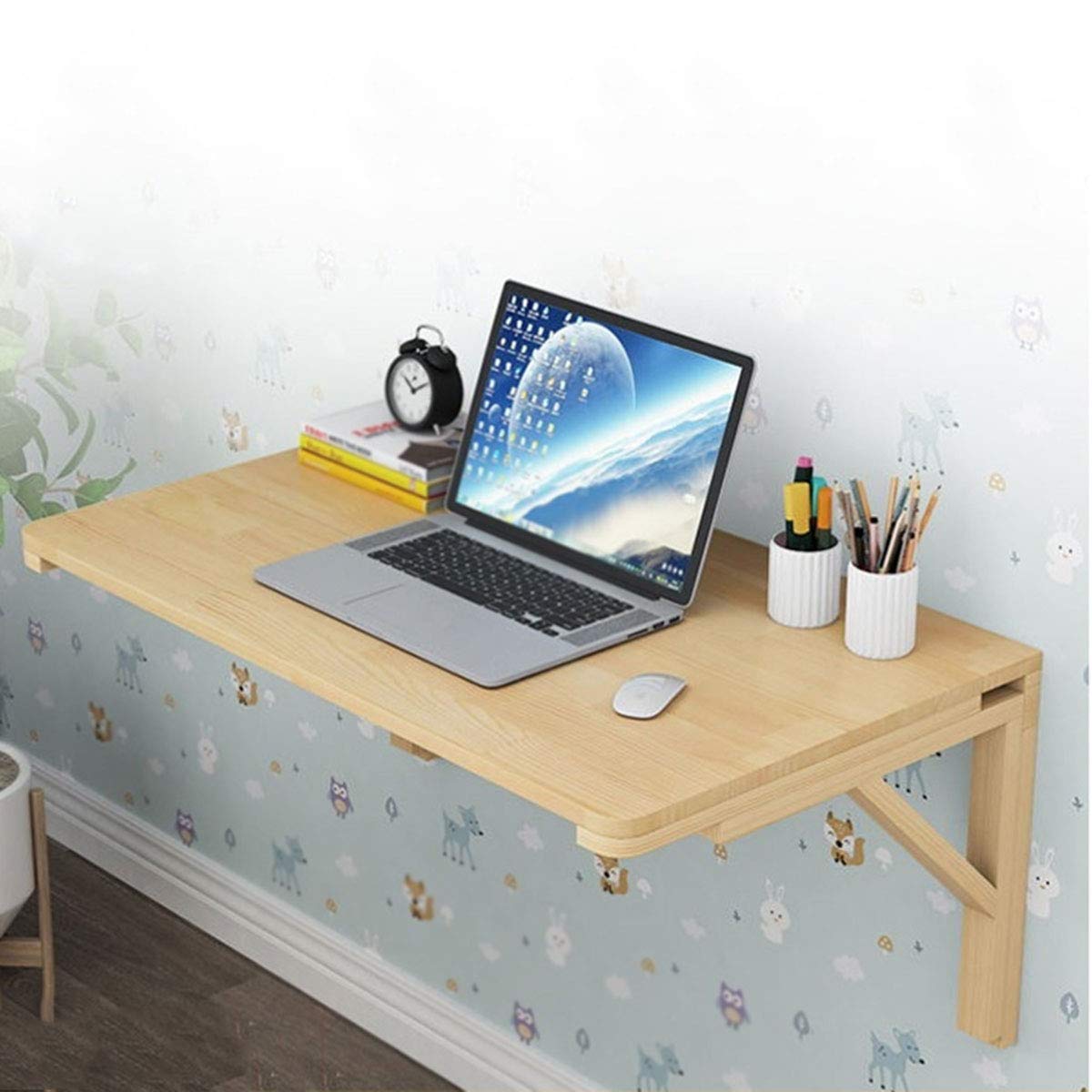 Table murale pliante en bois pour aménager un bureau d'ordinateur dans le salon