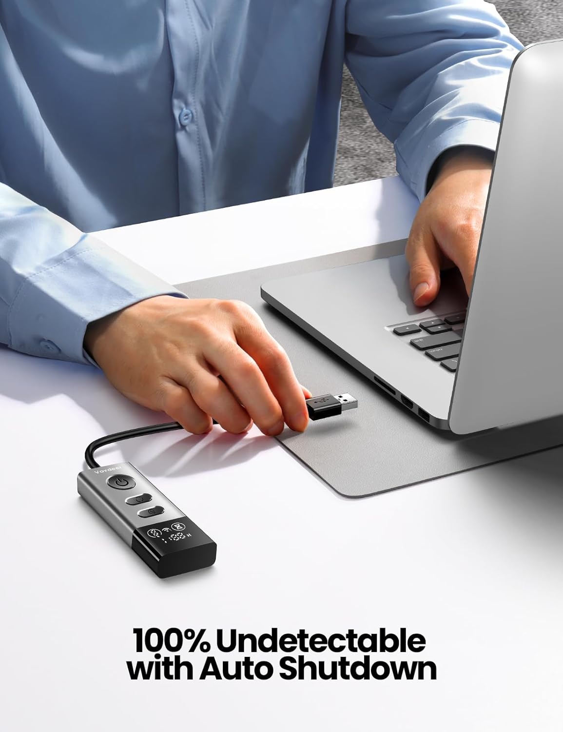 User plugging the Vaydeer S5 Pro Mouse Jiggler into a laptop's USB port.