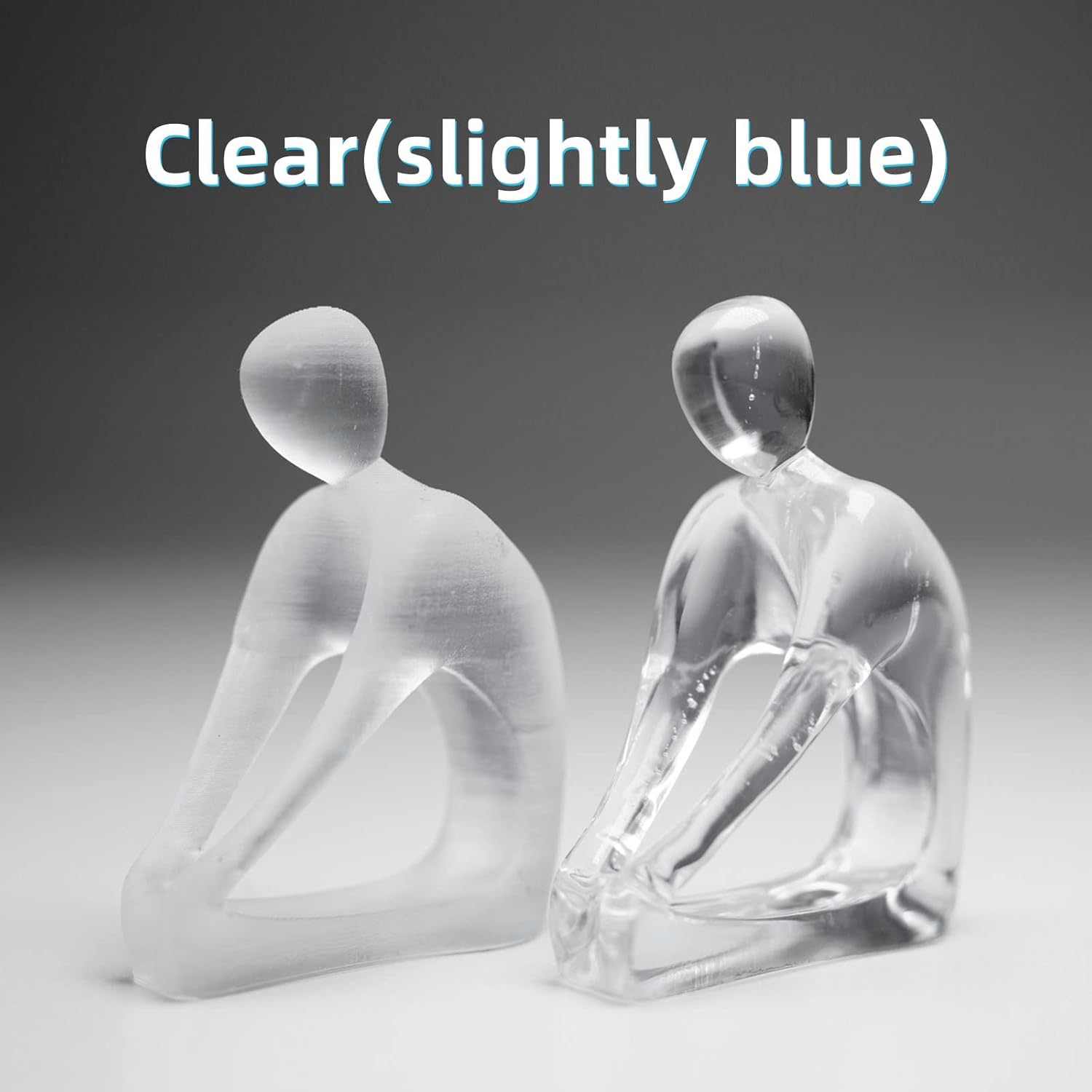 Comparison of a frosted and a clear 3D printed figurine, labeled 'Clear (slightly blue)'.
