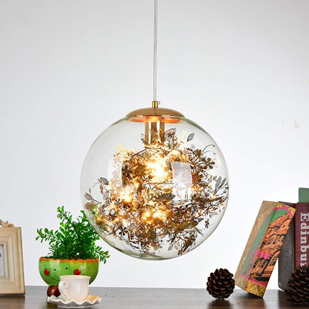 Suspension boule de verre dorée au design nordique et finitions d'art contemporain