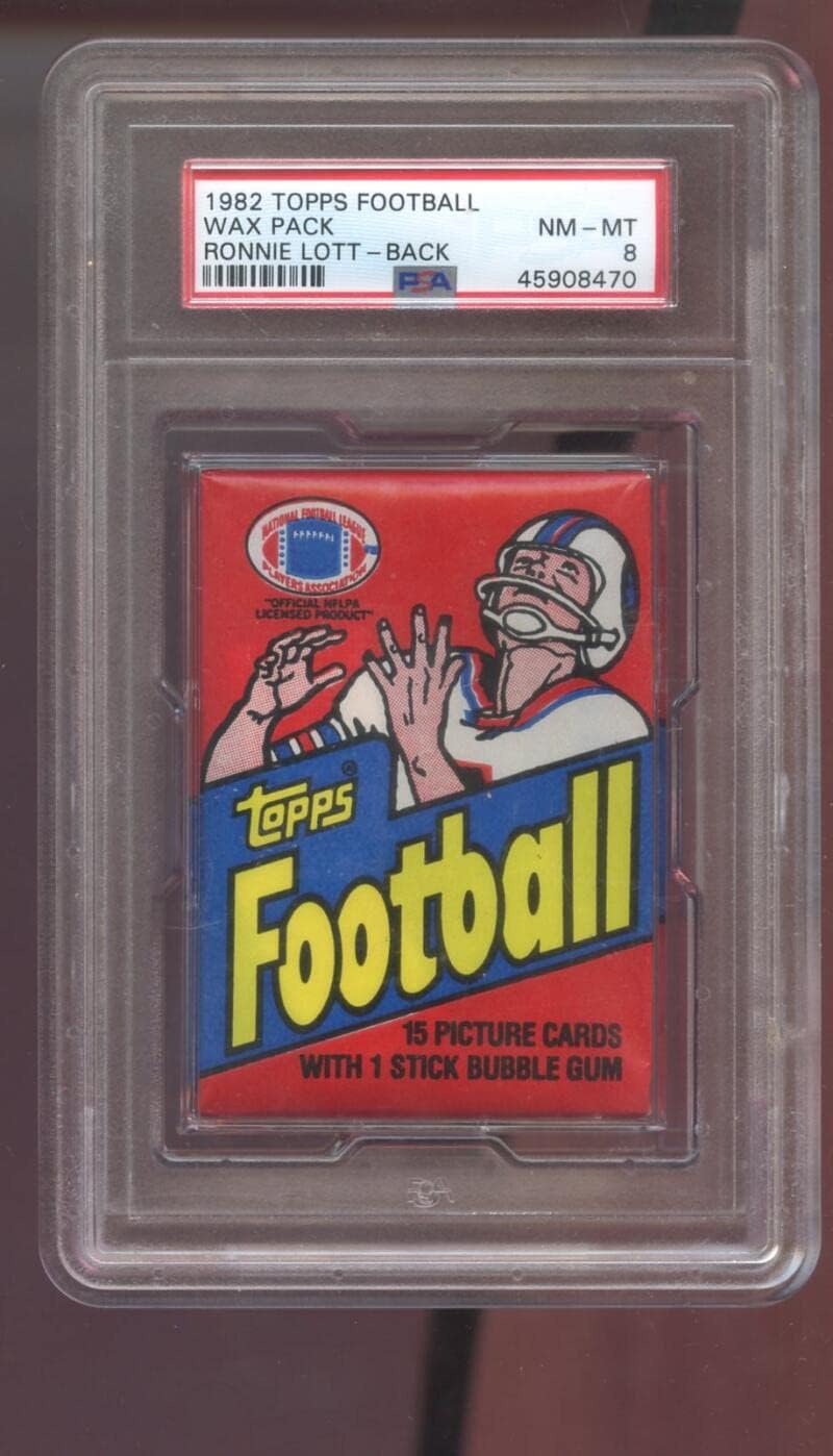 1982 Topps Football Card Unopened Wax Pack Graded PSA 8 Ronnie Lott ROOKIE RC #486 SHOWS NFL