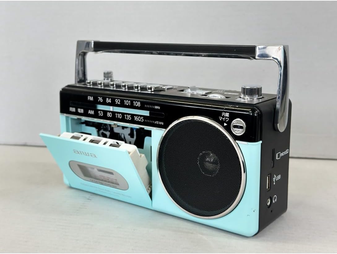 سمت view of the AIWA RCP3 showing the USB port, microSD card slot, and 3.5mm headphone jack.