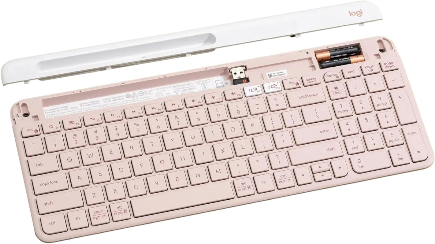 Ички view of the Logitech K585 keyboard showing the battery compartment and USB receiver slot.