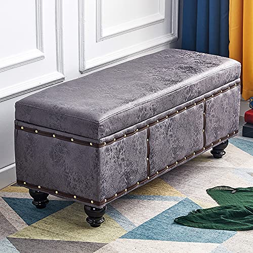 Banc de rangement en similicuir gris foncé au design moderne et finitions soignées