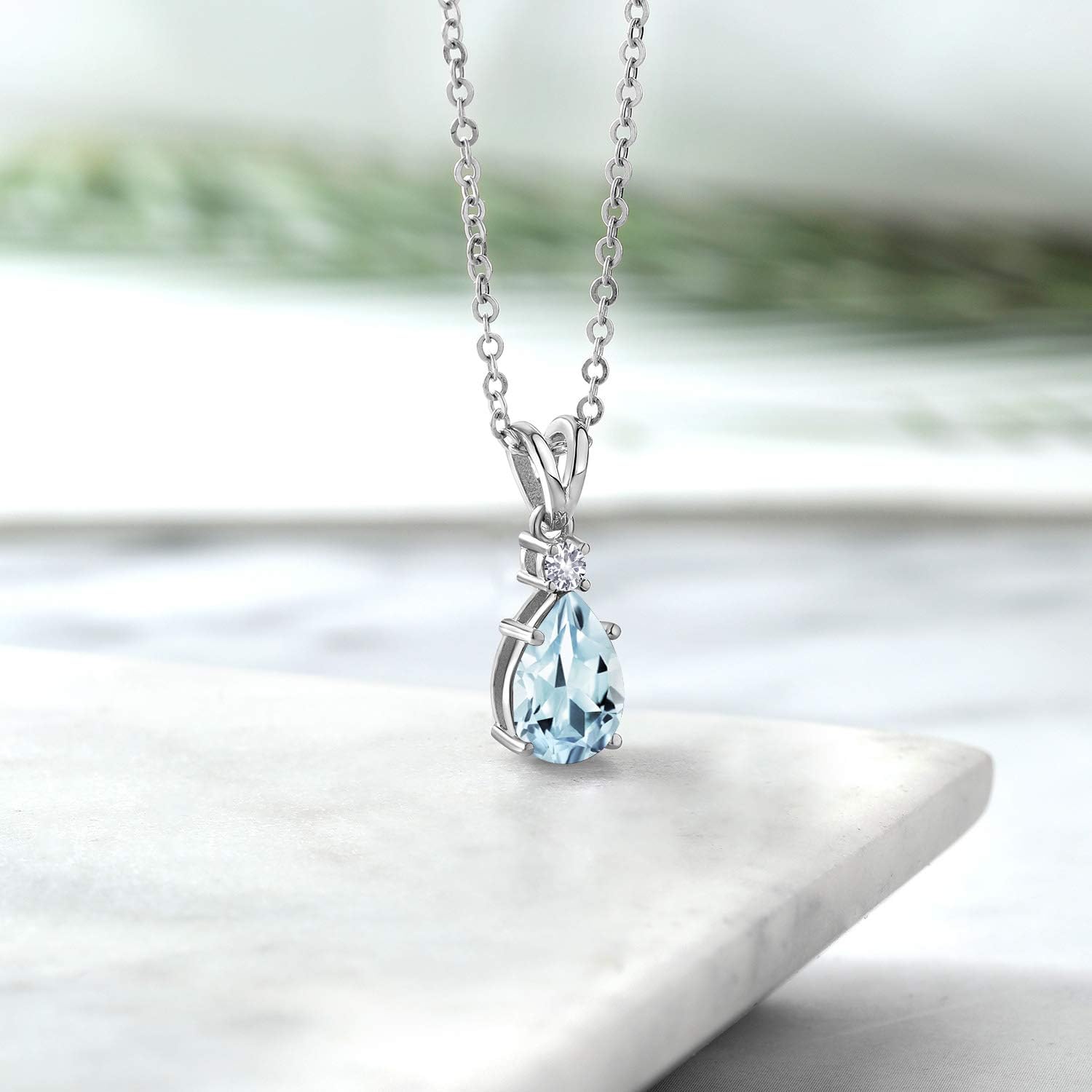 Gem Stone King 925 Sterling Silver Sky Blue Aquamarine and White Created Sapphire Pendant Necklace For Women (1.21 Cttw, Gemstone March Birthstone, Pear Shape 9X6MM, with 18 inch Chain)