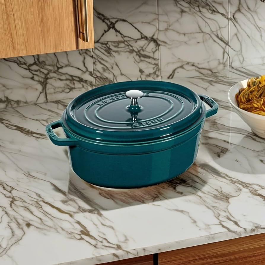 Amazon.com: STAUB 1003842 Cast Iron Roaster/Cocotte, Oval 33 cm Amazon.com: STAUB 1003842 Cast Iron Roaster/Cocotte, Oval 33 cm
