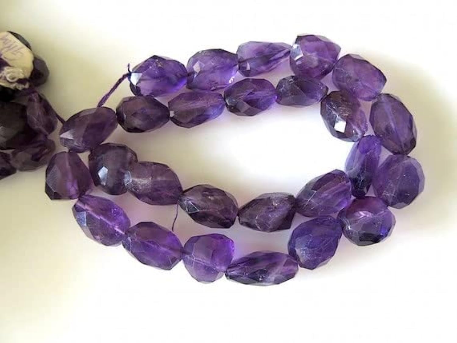 Améthyste naturelle facettée LKBEADS contre le manque d'inspiration en création de bijoux
