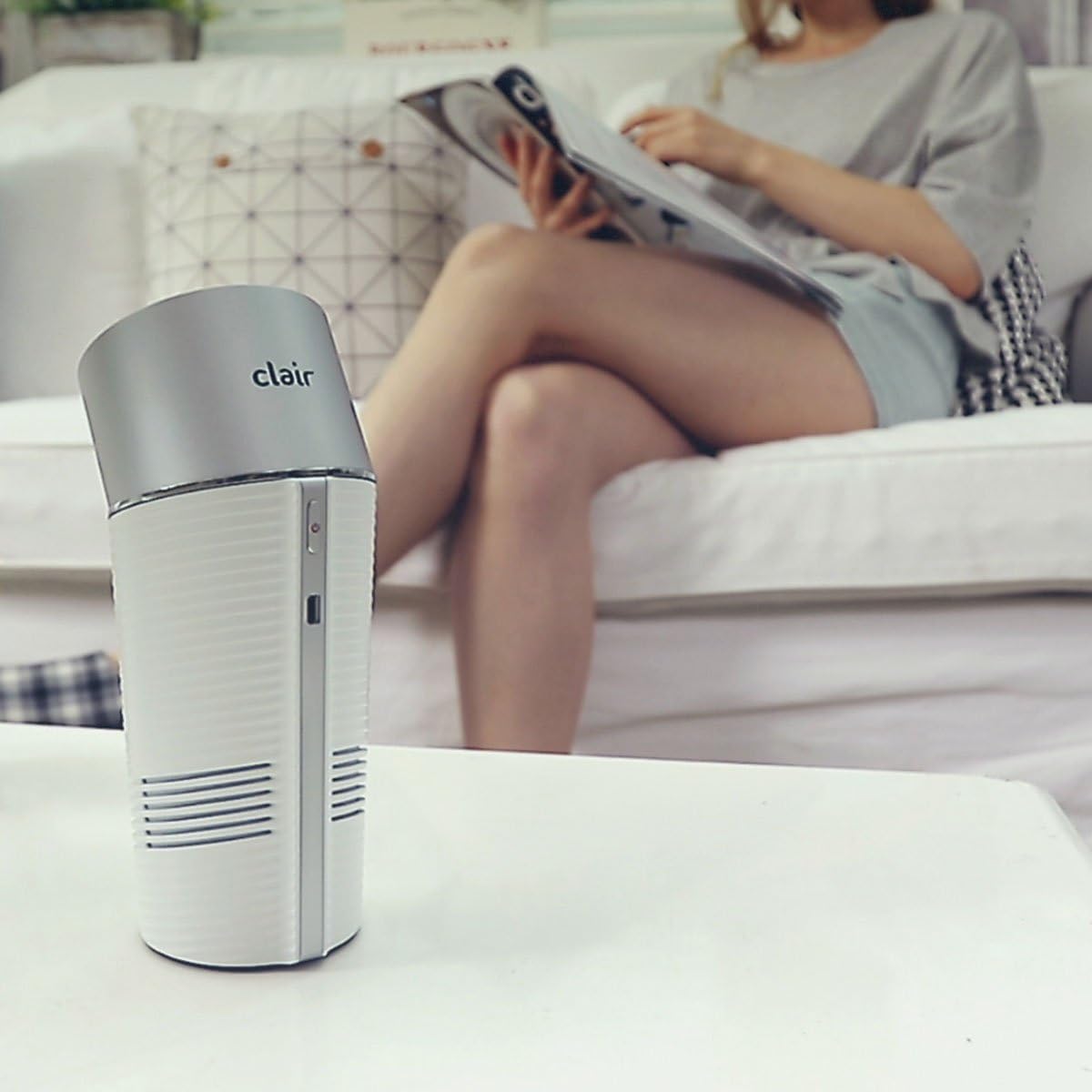 Clair-B Air Purifier placed on a table in a living room