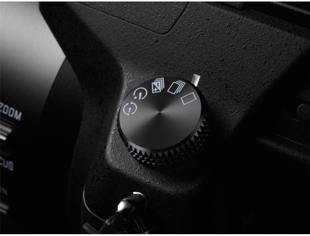 Close-up of the Panasonic LUMIX FZ1000 mode dial with various shooting modes