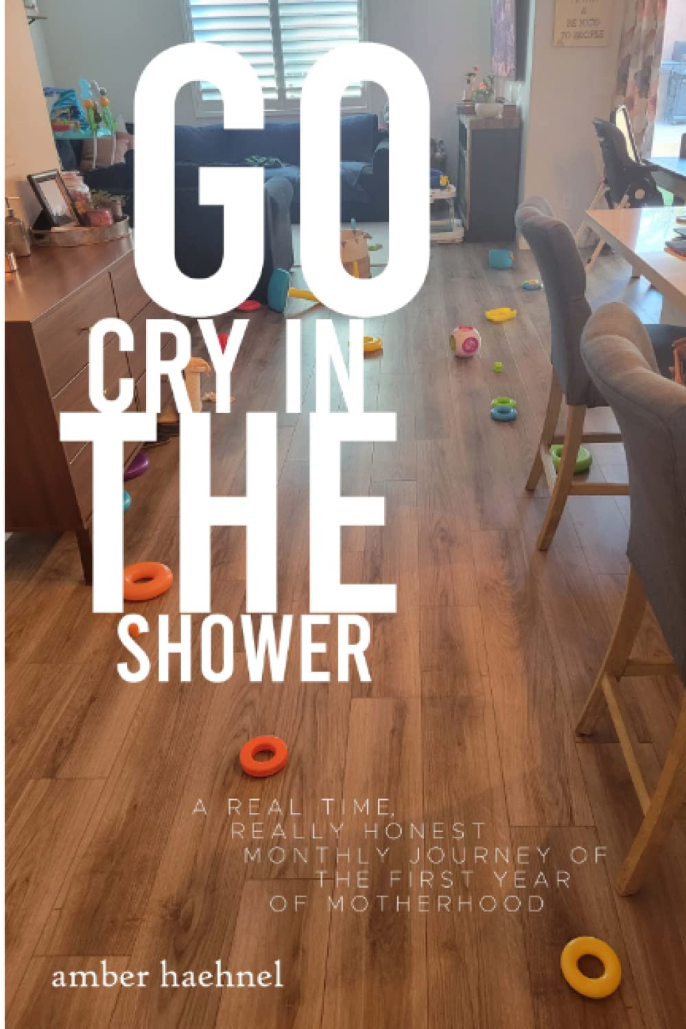 Independently published Go Cry in the Shower: a real time, really honest monthly journal of the first year of motherhood