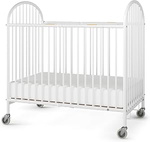 Foundations Pinnacle Metal Baby & Toddler Folding Crib, Portable Baby Crib with Foam Mattress and Commercial Grade 3" Casters, Compact Hotel Crib (White)