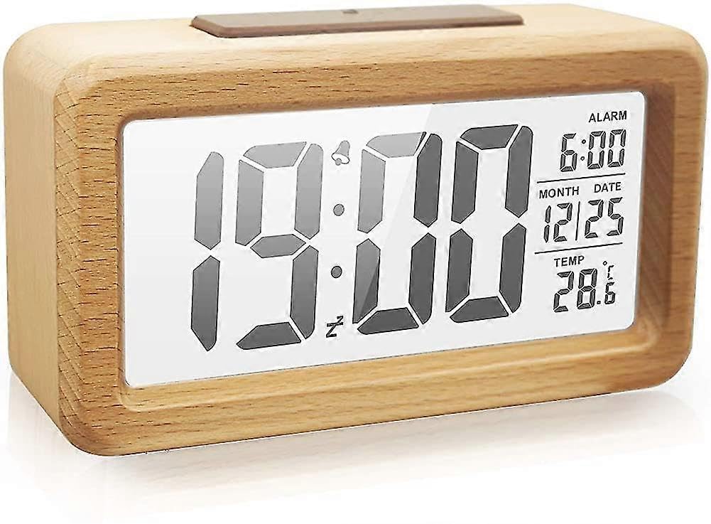 Réveil numérique LED en bois idéal sur la table de chevet scandinave