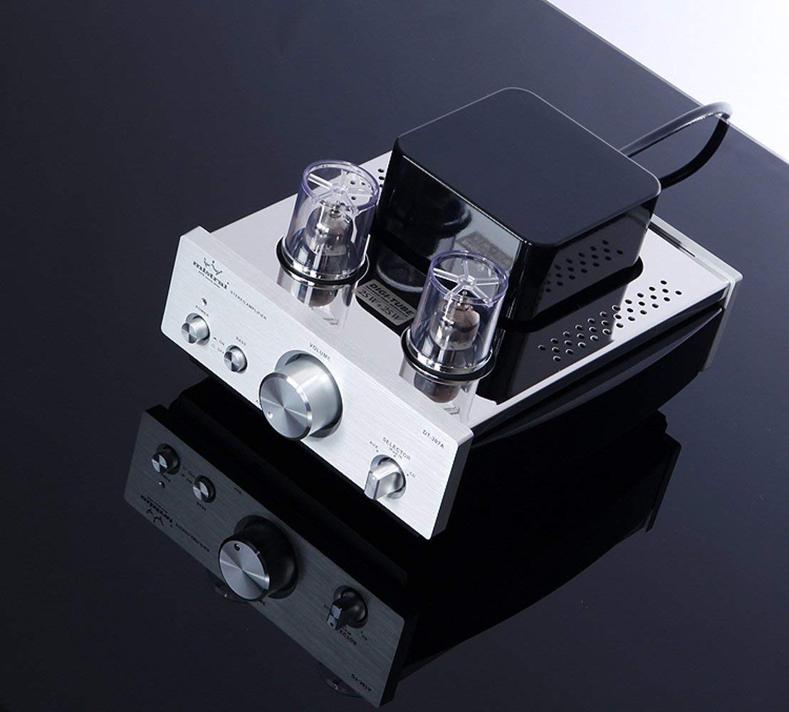 Front view of the Mistral DT-307B amplifier, showing the power button, bass boost switch, volume knob, and input selector.