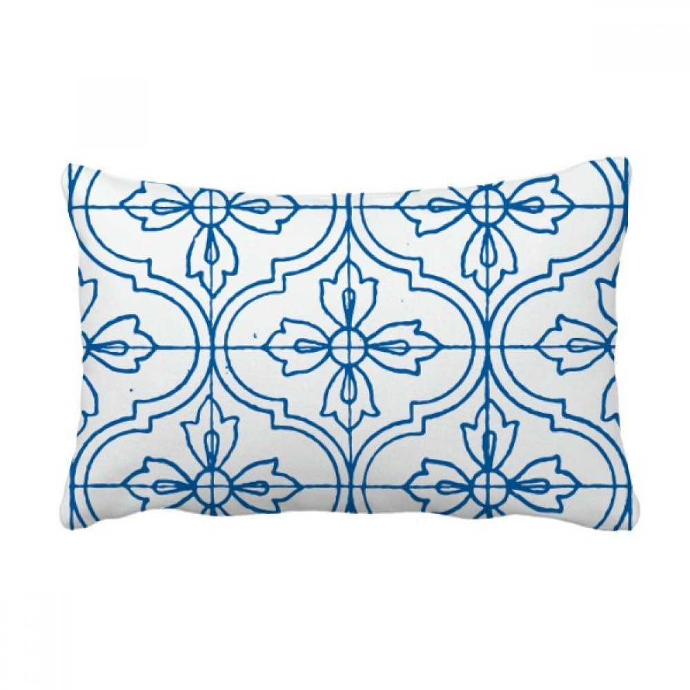 Coussin lombaire bleu Talavera contre le mal de dos sur le canapé