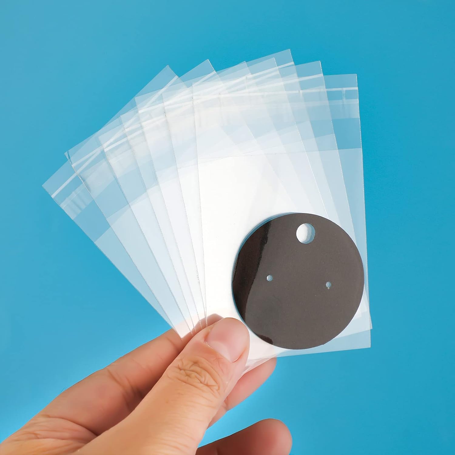 SAVITA 50pcs Earring Display Cards with 50pcs Self-Adhesive Bags, Mini Round Earring Holder Tags Kraft Paper Ear Cards for DIY Ear Studs Earring Jewelry Display Hanging (Black)