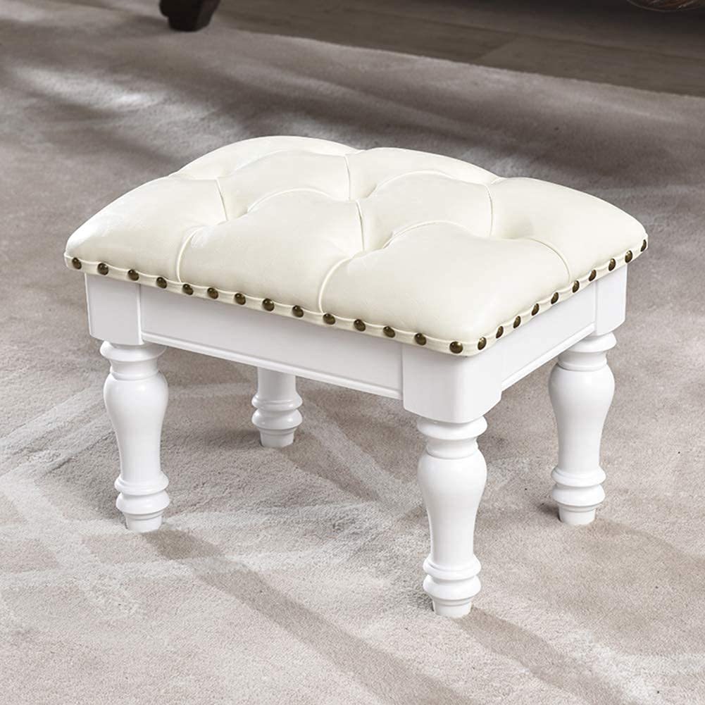 Repose-pieds en cuir blanc avec bouton décoratif pour salon cocooning