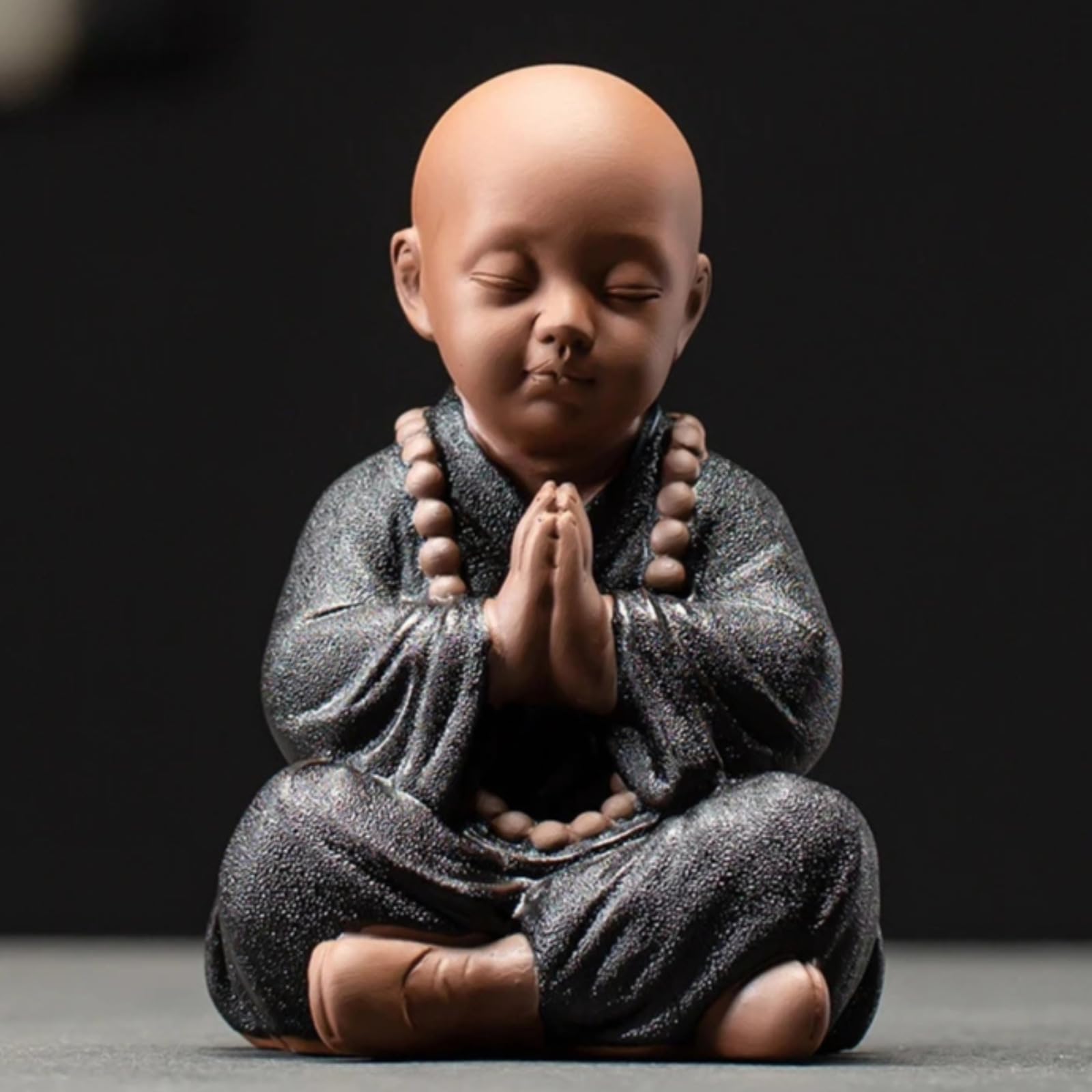 Statue de moine bouddhiste soulager le stress avec une decoration de meditation