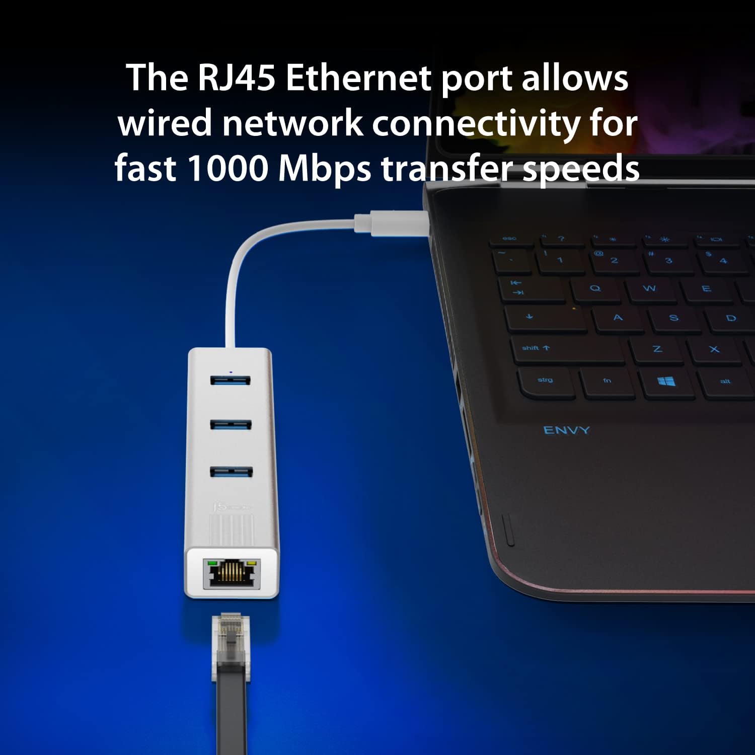 j5create JCH474 USB-C 3-Port Hub with Gigabit Ethernet connected to a laptop, with an Ethernet cable plugged into the hub.