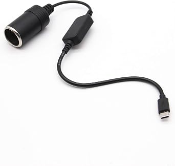 It looks like Rivian has removed two 12V outlets in the R1T new models