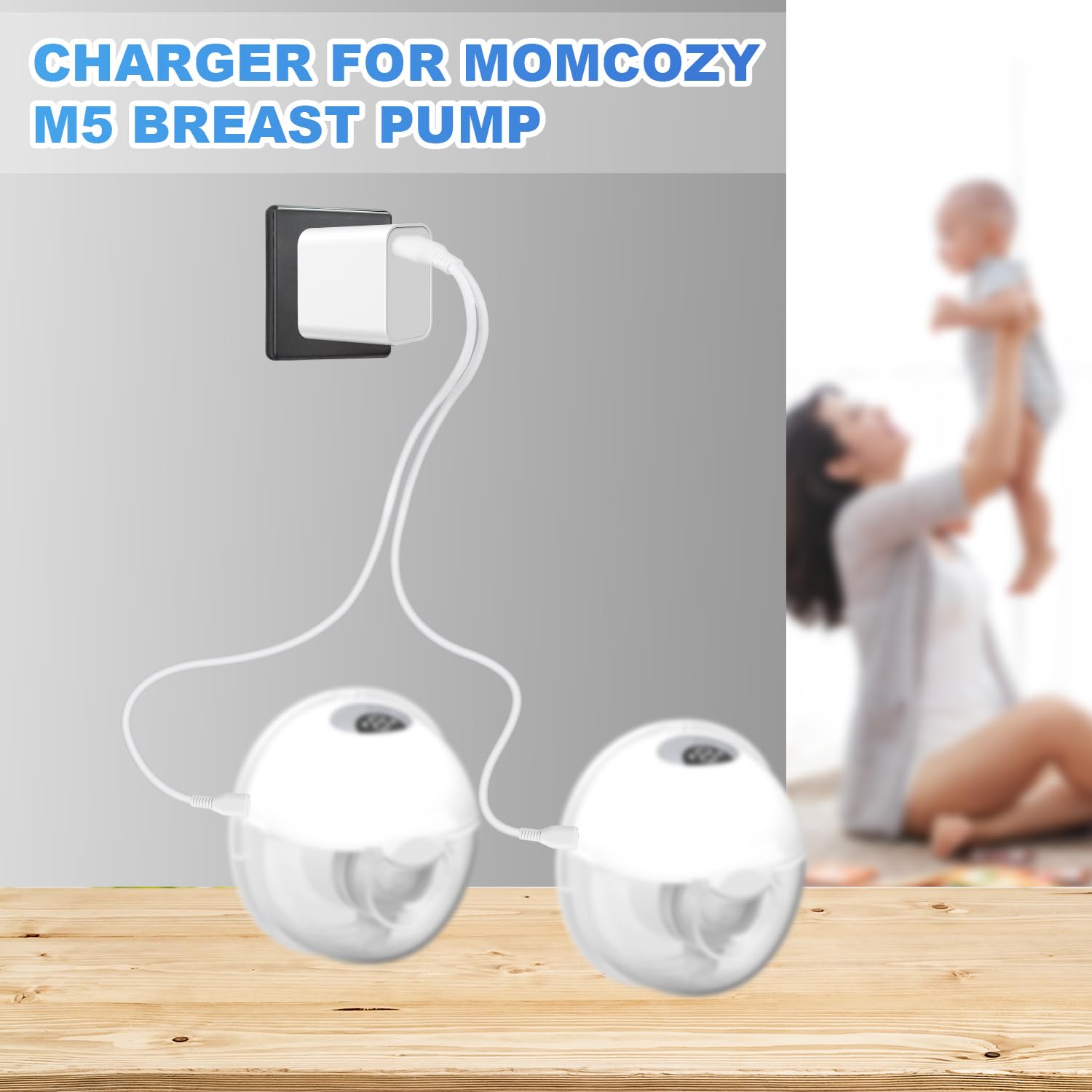 Image showing two Momcozy breast pumps connected to a wall charger via the BTFO USB charging cable, with a blurred background of a person holding a baby.
