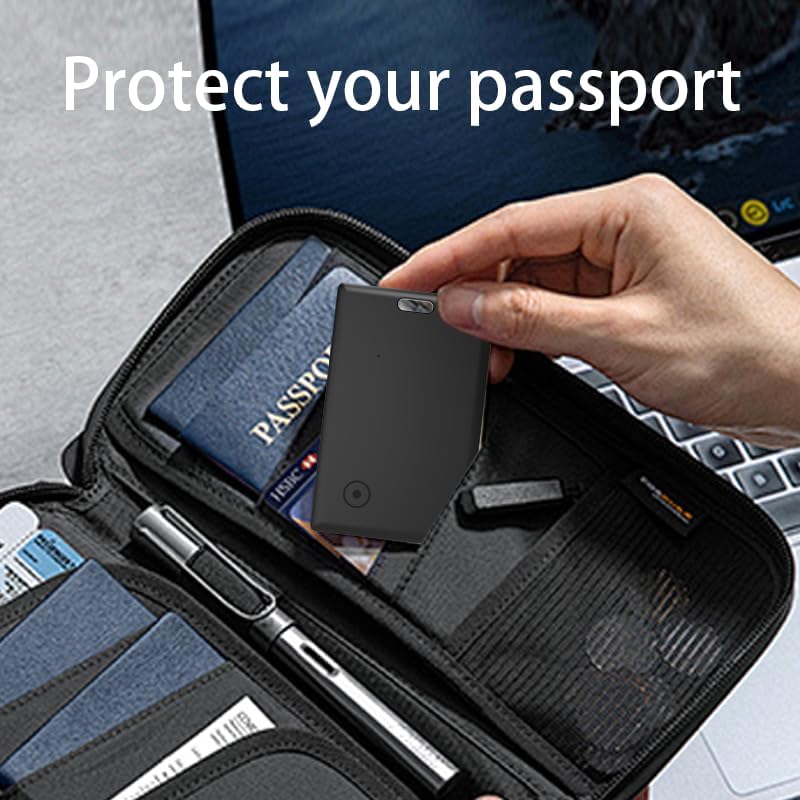 Novzix S11 tracker card placed inside a passport holder
