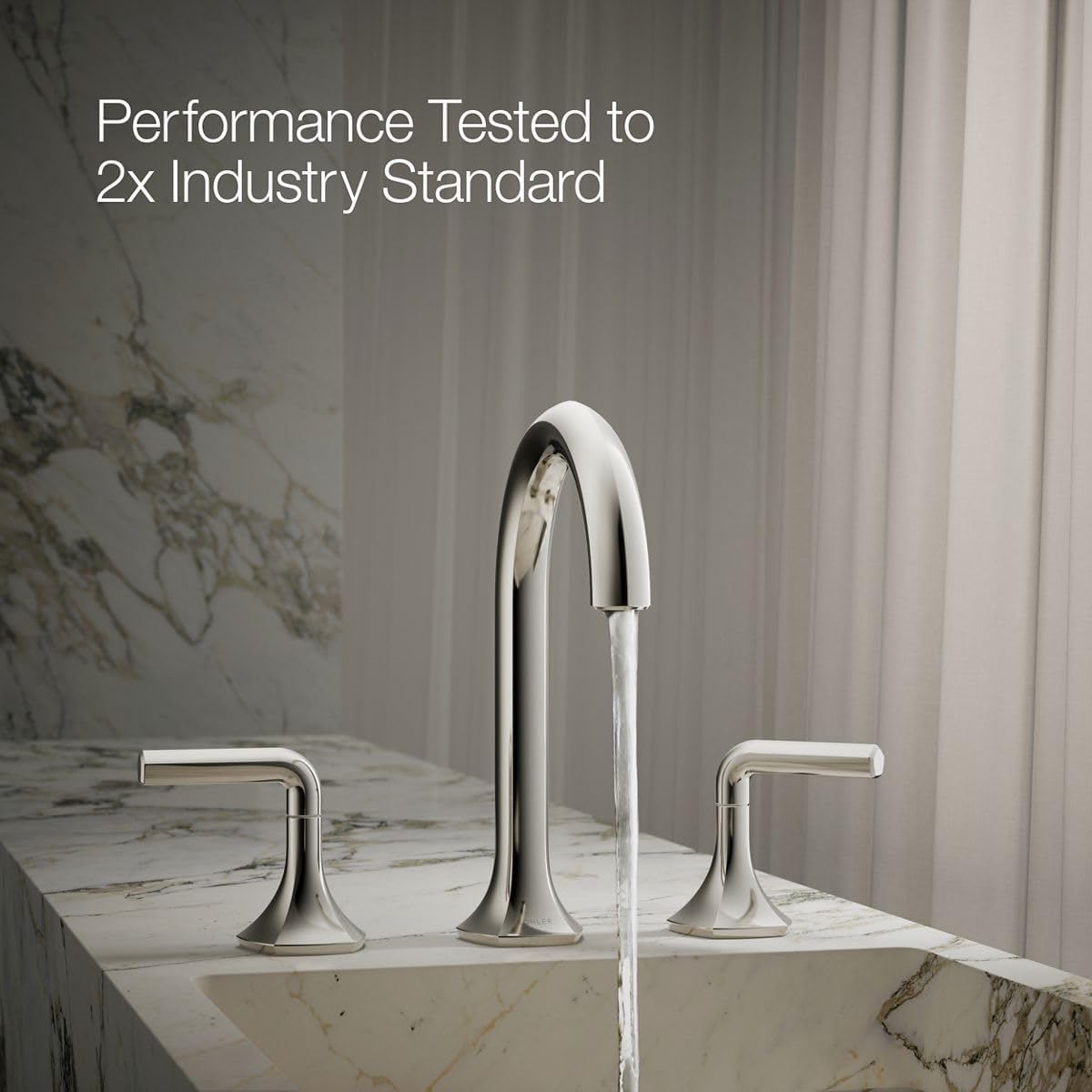 KOHLER Occasion Faucet Spout with water flowing into a sink, demonstrating water flow.