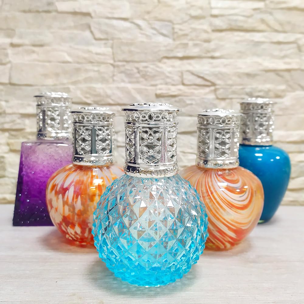 Pack Ahorro Lámpara Catalítica Blue Diamonds + Fragancia Winter Citrus (200ml) + Limpiador Neutro (200ml) + Mecha de Repuesto