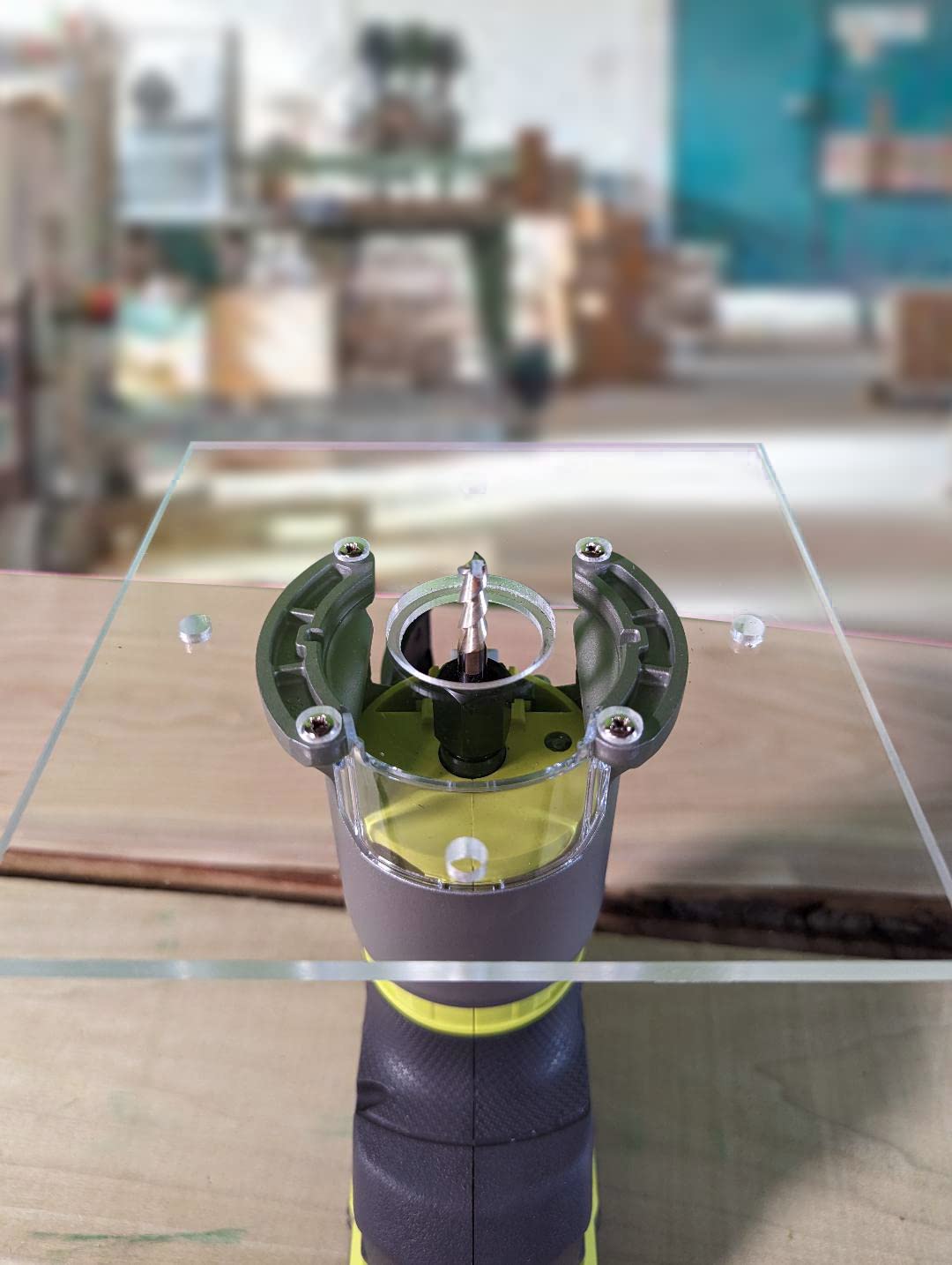 1/4" thick plexiglass base plate for ryobi one+ PCL424B router with a recess for bushings. (6" square)