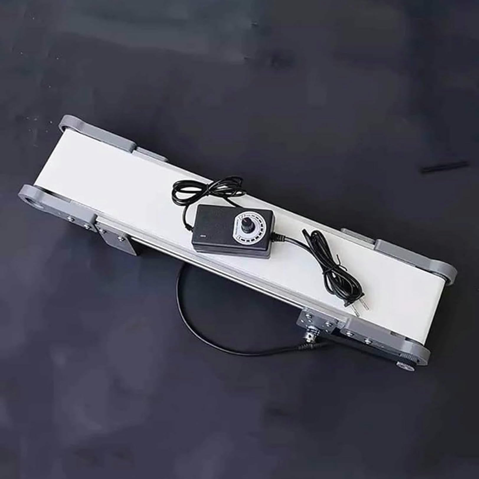 Bande transporteuse vitesse variable rotation avant arrière friction
