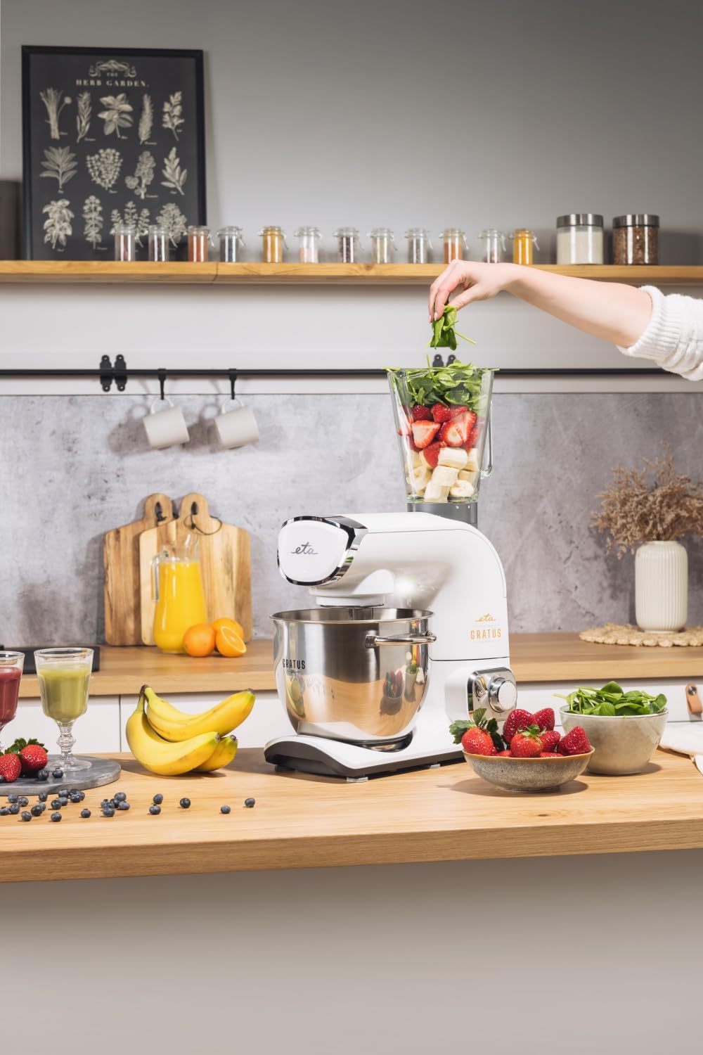 Glass blender attachment in use, blending fruits and vegetables