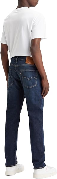 Close-up of the denim weave and stitching on the Levi's 502 Taper jeans pocket.