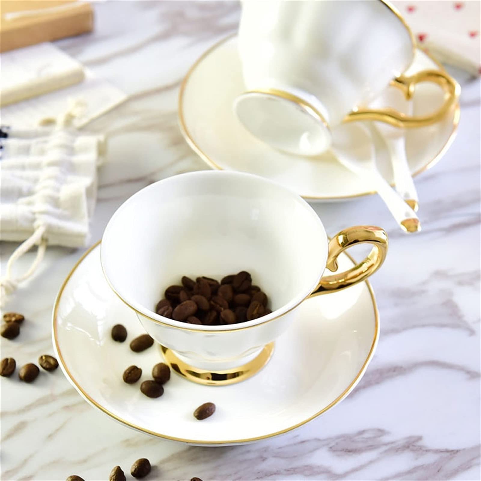 Zestaw kubków do herbaty i spodków wielokrotnego użytku porcelany kostnej filiżanki do espresso filiżanki luksusowa herbata ananasowa filiżanka śniadaniowa kubek kawy
