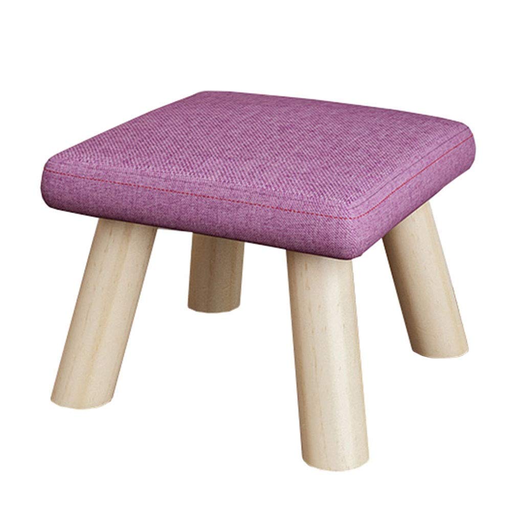 Tabouret en bois massif pour entrée chic : changez de chaussures confortablement dans le salon