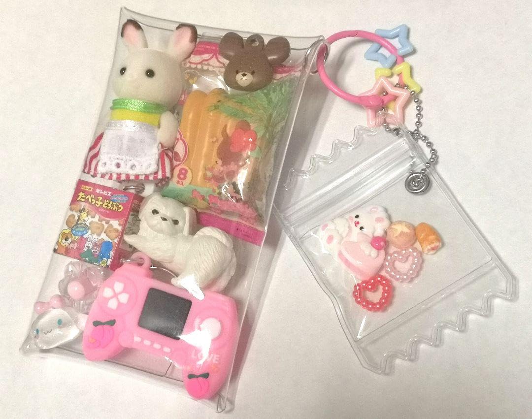 【一点物】物語を詰め込んだガチャ詰めポーチ風アクセサリーセット Amazon.co.jp: ピンク・赤系ガチャ詰めポーチ : おもちゃ