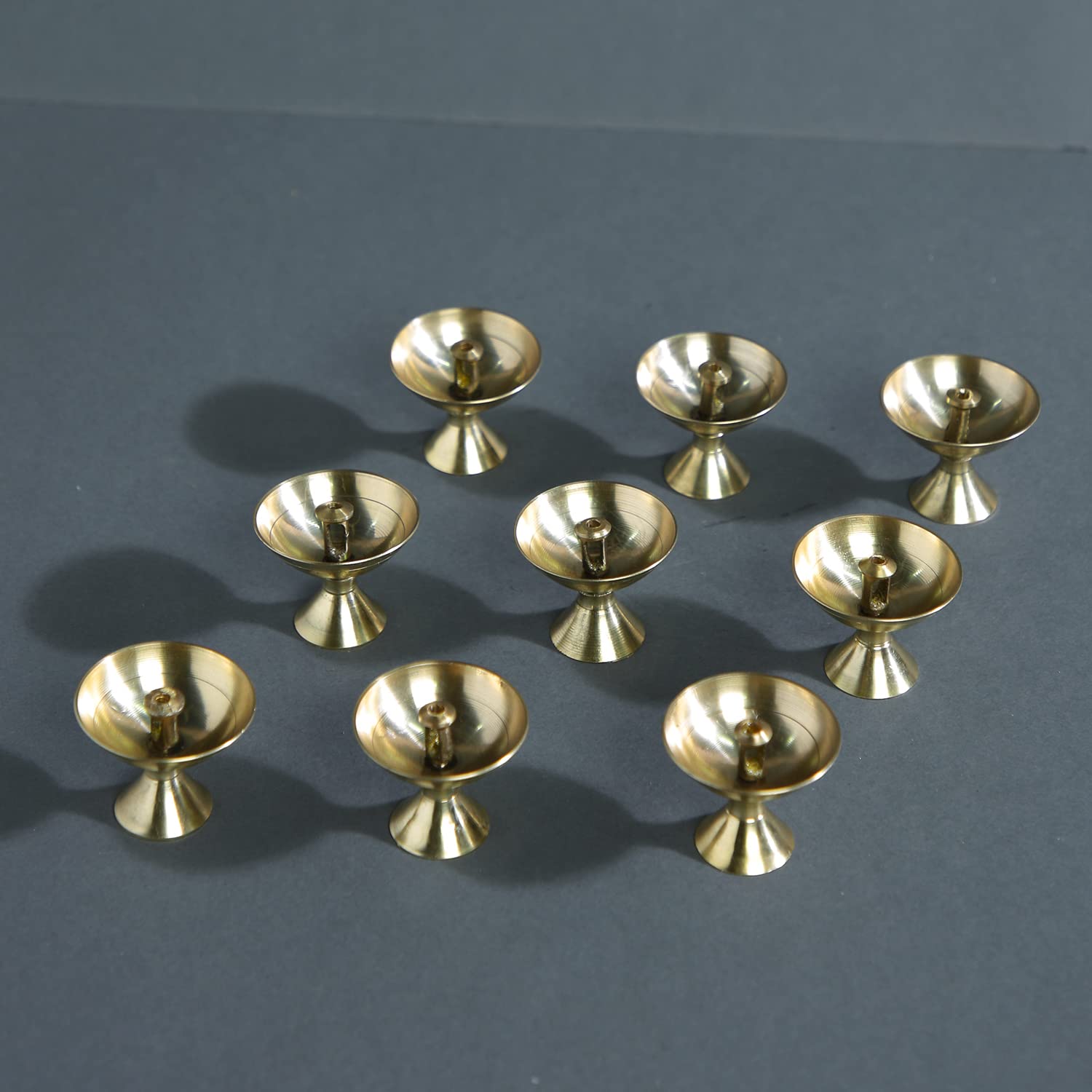 Amazon Brand - Umi Brass Akhand Small Diya Oil Lamp Holder for Puja (4 x 3.2 CM, Golden) (9 Piece) (B0CYLDBP1Y) Amazon Price History, Amazon Price Tracker