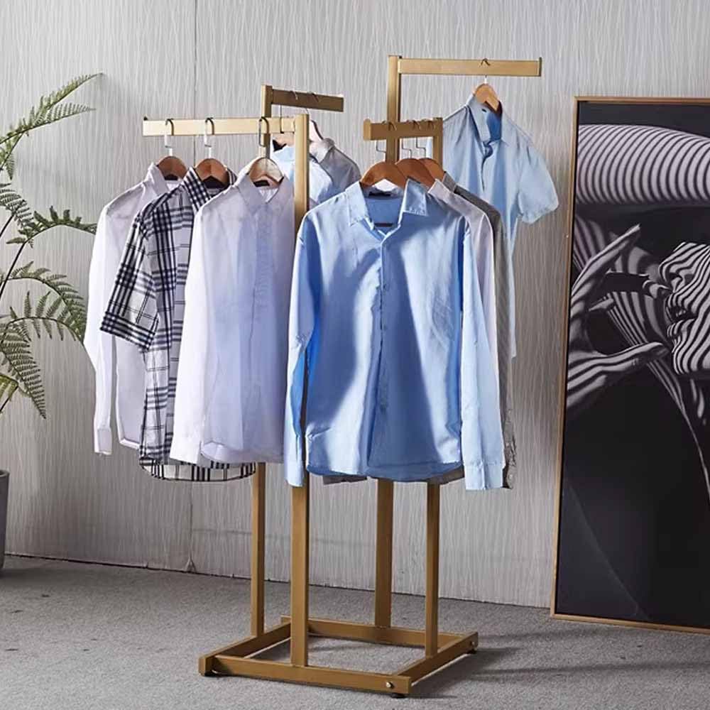 Présentoir à vêtements noir en métal portant de magasin solide sur pied