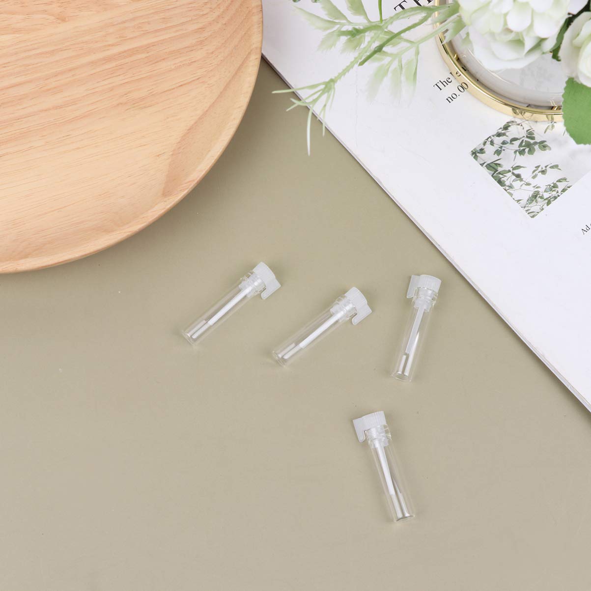 500 sztuk perfum butelki wielokrotnego napełniania szklana butelka klips do długopisu pojemnik na drobną mgiełkę z pokrywką pojemniki z rozpylaczem wielokrotnego napełniania puste perfumy podróżny poj