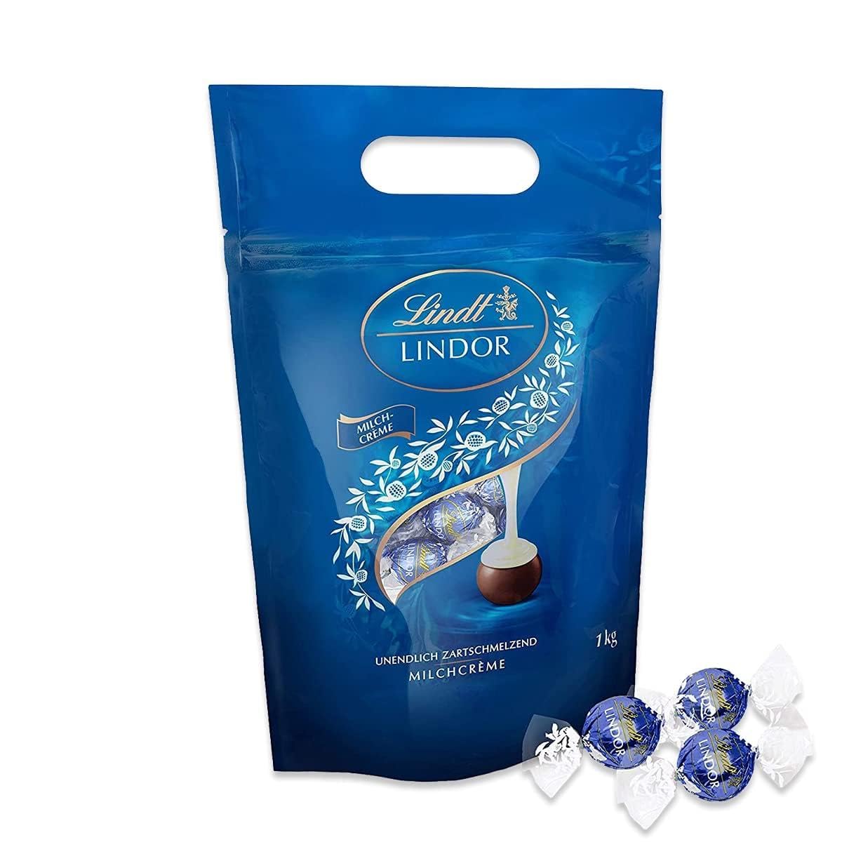 Lindt LINDOR Schokoladen Kugeln Milchcrème | 1 kg Beutel, wiederverschließbar l ca. 80 Milch-Schokolade mit Milchcrème-Füllung | Großpackung, Pralinen-Geschenk, Schokoladengeschenk