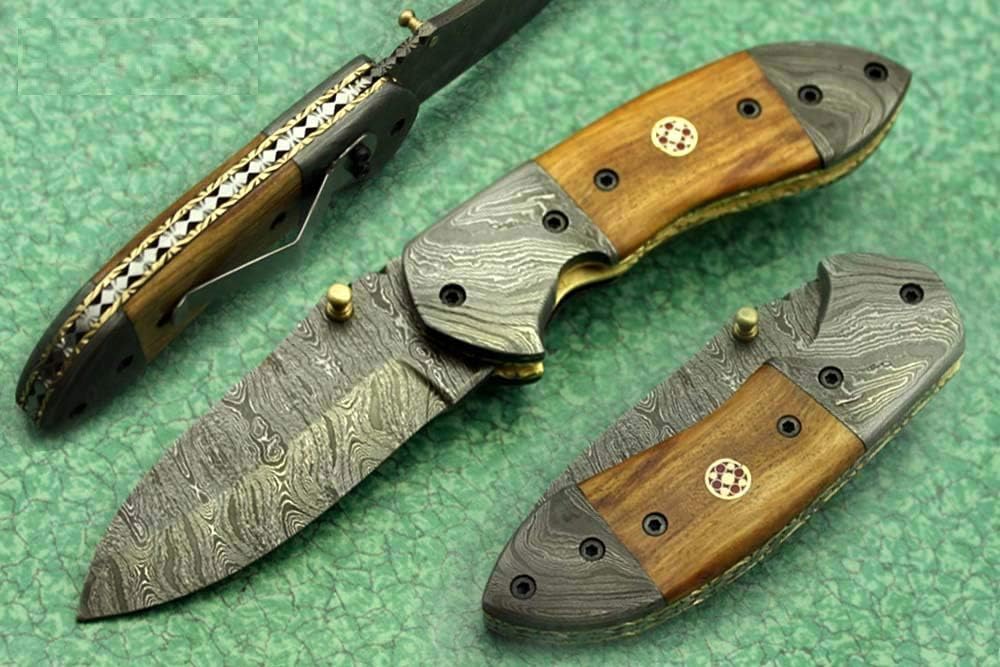 7 Inch Long Hand Forged Damascus Steel Folding Knife, Natural Wood, Camel Bone, Bull & Ram Horn Scales with Damascus Bolster, Equipped with Liner Lock and Thumb knob, Cow Hide Leather Sheath