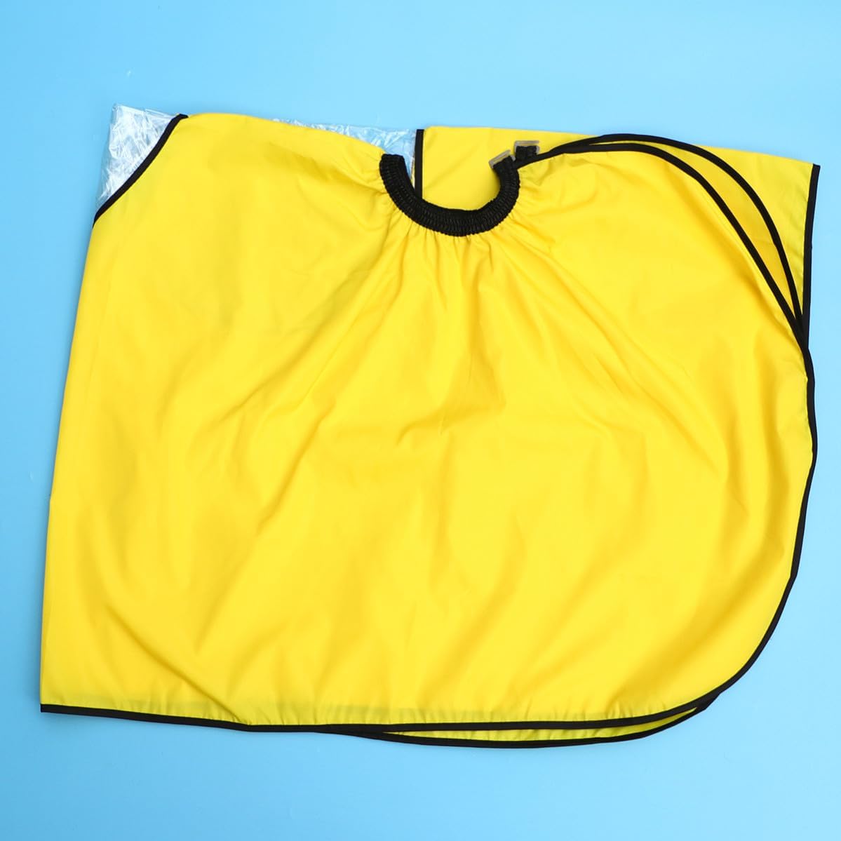 Yellow Hairdressing Cape Made of Non-woven Fabrics, Easy to Maintain and Shield Neck, Suitable for Professional and Personal Use Hair Cutting Apron