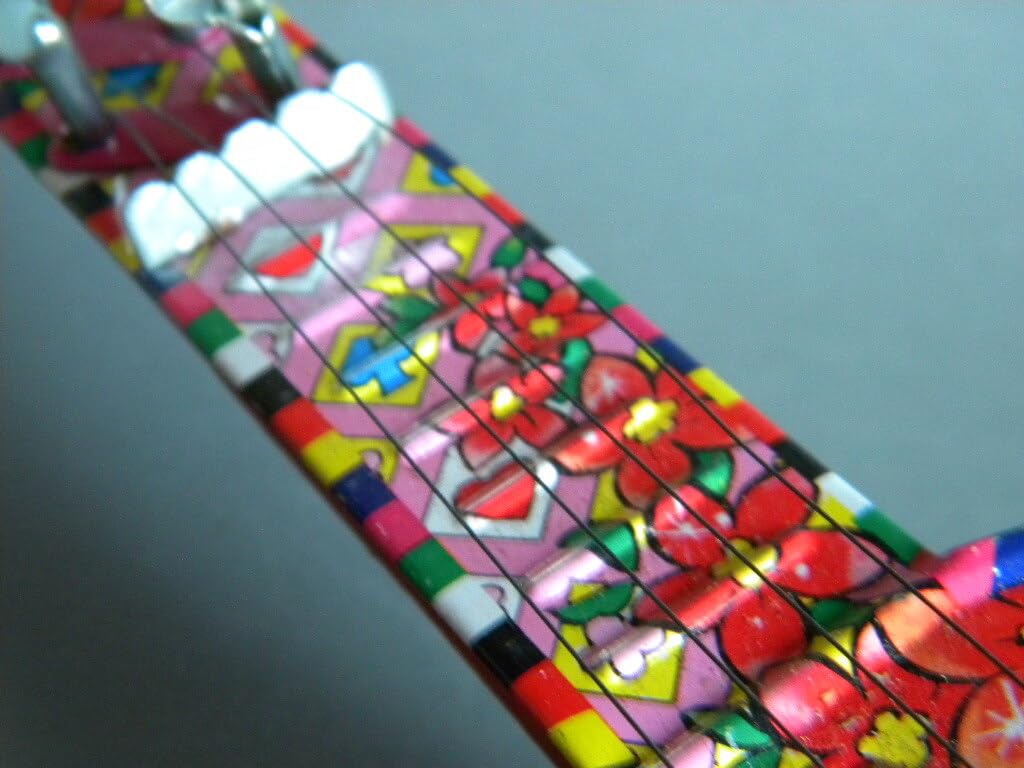 【昭和レトロ】　ポソピー　❣️ ウクレレ ❣️ おもちゃ　❣️ ブリキ　❣️ 気分はミュージシャン！子ども用の ウクレレ | フランスの知育玩具