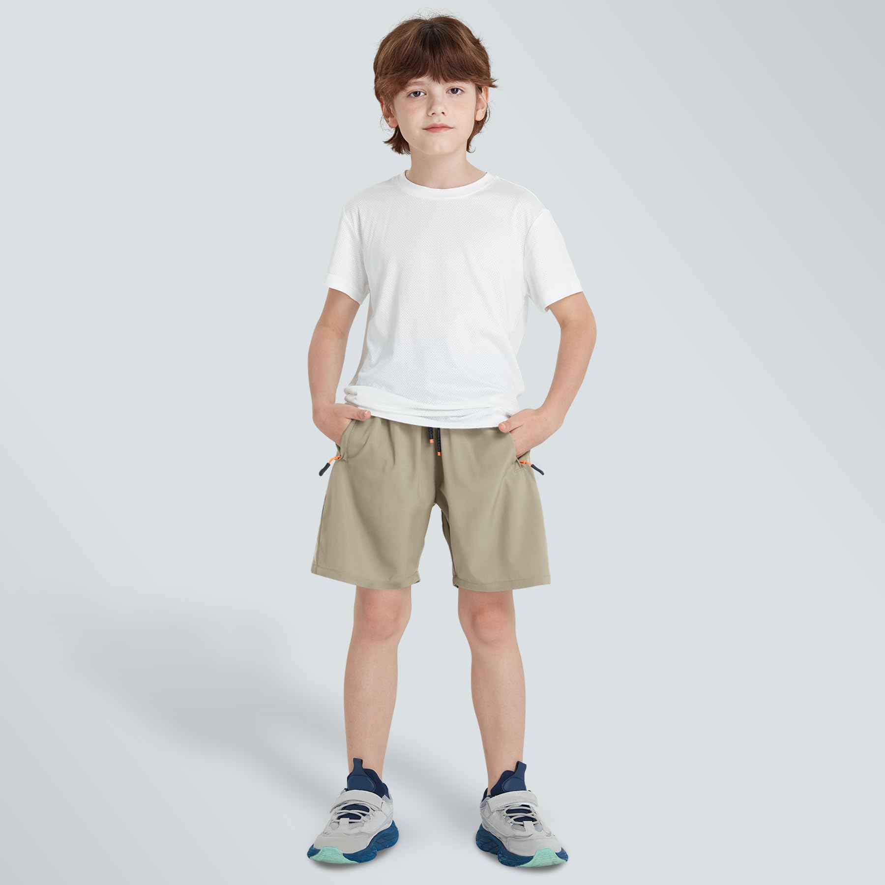 Pantalones cortos deportivos de secado rápido para niños con bolsillos con cremallera