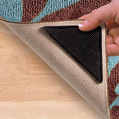 Shop-Story - Set mit 4 rutschfesten Halterungen für Teppiche, dreieckig, mit Aufklebern Cover